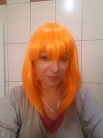 Zdj�cie osoby, kt�ra kupi�a Peruka pomara�czowa GLAM z grzywk�