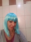 Zdj�cie osoby, kt�ra kupi�a Peruka jasny turkus GLAM z grzywk�